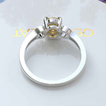 Load image into Gallery viewer, Golden Sunlight Captured: Oval Cut Yellow Sapphire in Solitaire Ring Setting
