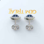 Load image into Gallery viewer, Deep Blue Radiance: Double Halo London Blue Topaz Stud Earrings.
