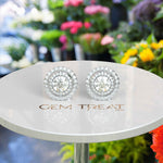 Load image into Gallery viewer, Celestial Glow: Colorless Moissanite Round Stud Earrings with Double Halo.
