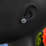 Load image into Gallery viewer, Deep Blue Radiance: Double Halo London Blue Topaz Stud Earrings.
