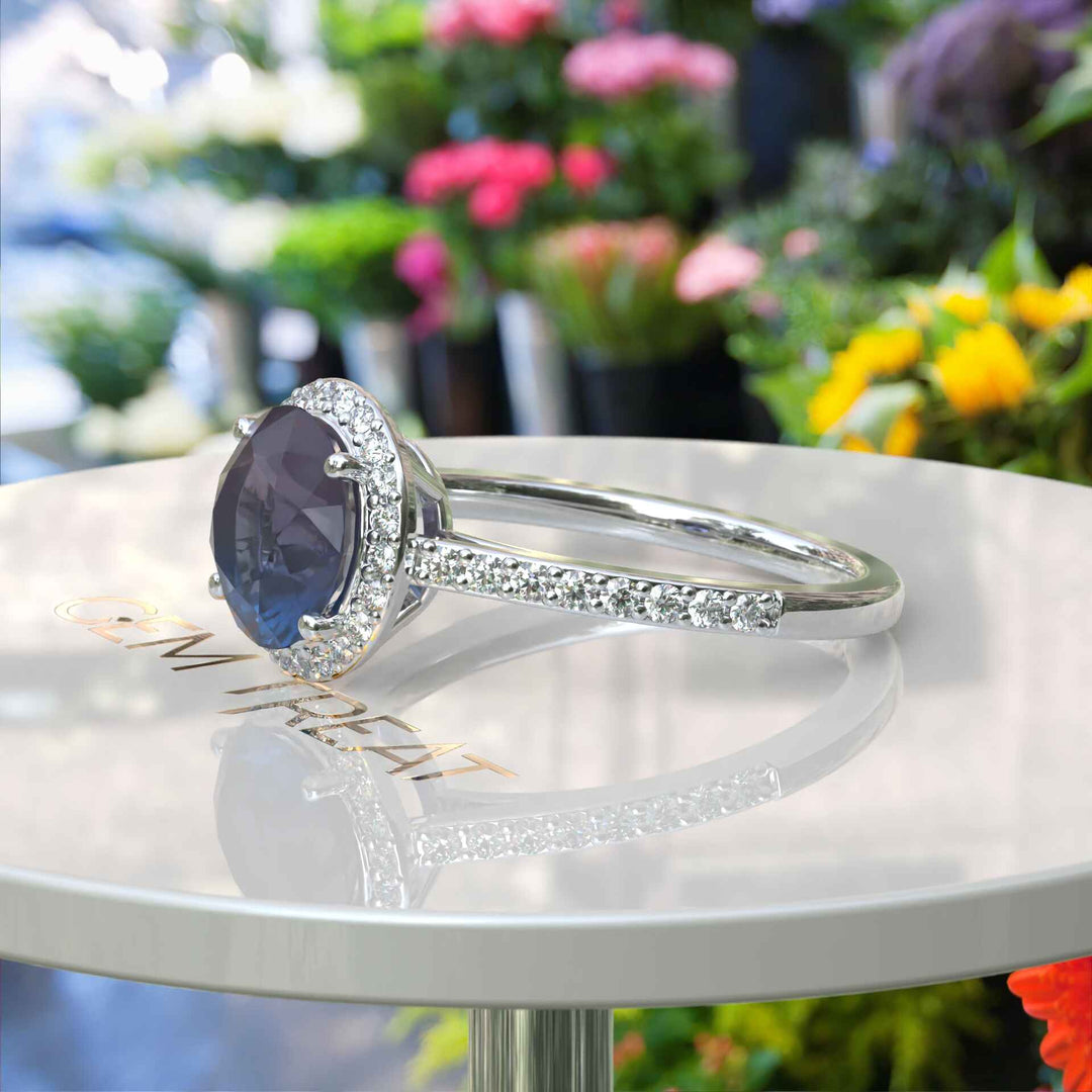 Nature's Palette Embodied: 2.0ct Round Alexandrite Halo Ring Radiates Color Shifts