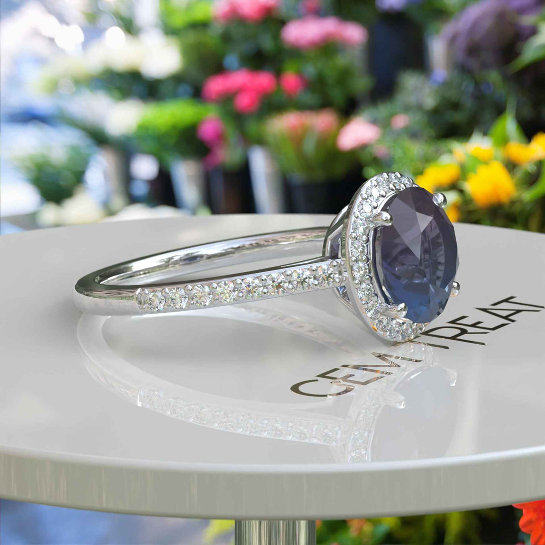 Nature's Palette Embodied: 2.0ct Round Alexandrite Halo Ring Radiates Color Shifts