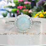 Load image into Gallery viewer, Cosmic Beauty: Round Opal Halo Ring in Silver Setting
