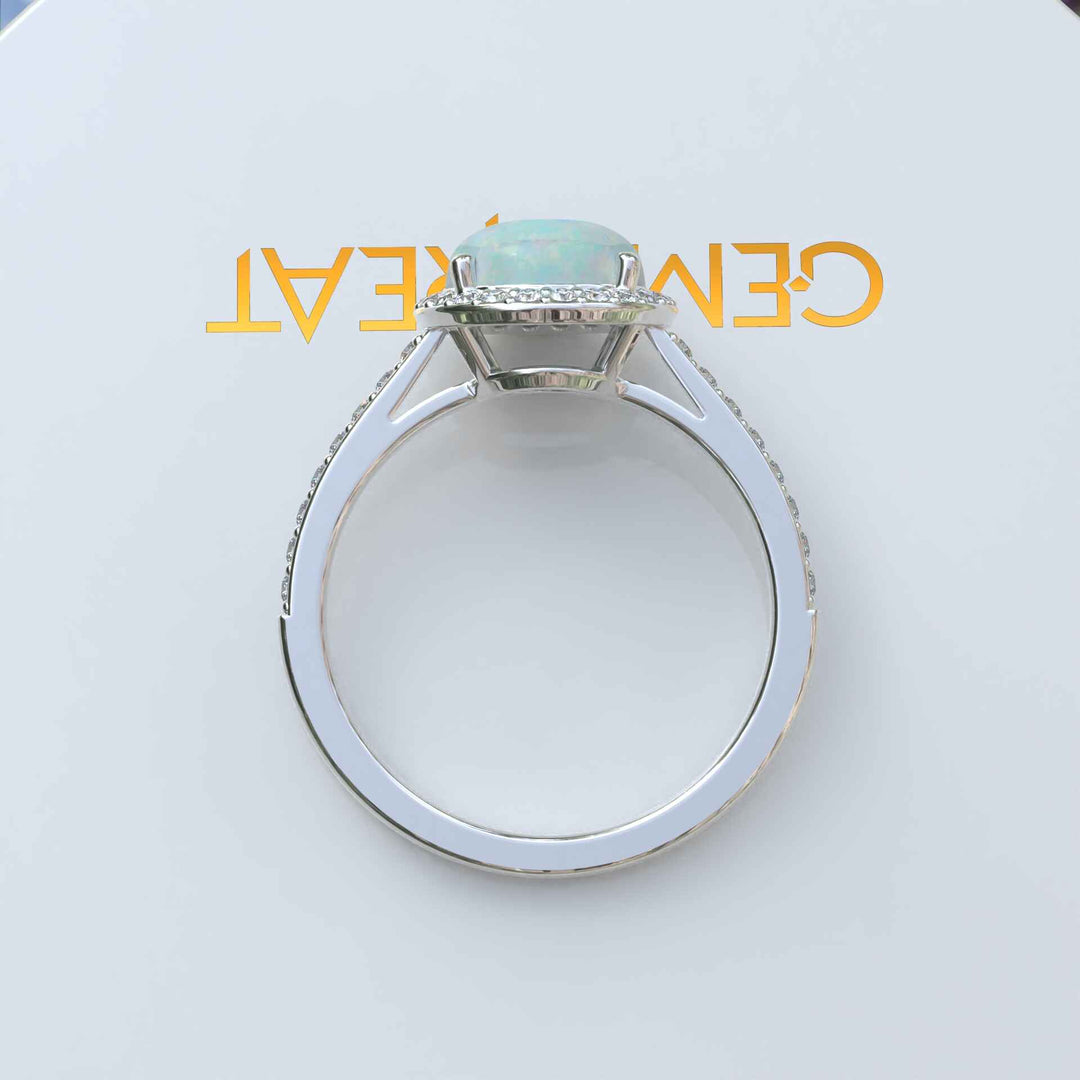 Cosmic Beauty: Round Opal Halo Ring in Silver Setting