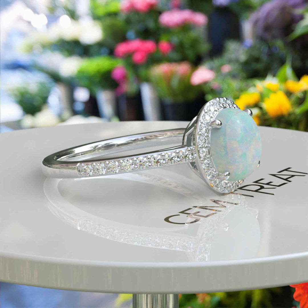 Cosmic Beauty: Round Opal Halo Ring in Silver Setting