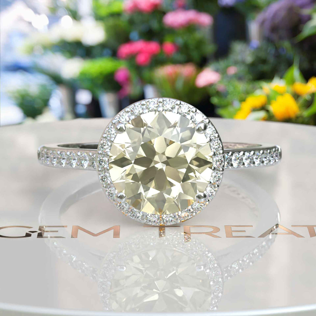 Celebrate Love with a Luminous 2ct Round Yellow Moissanite Halo Ring