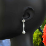 Load image into Gallery viewer, Classic Meets Sparkle: Pearl Drop Earrings with Moissanite Centerpiece.
