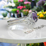 Load image into Gallery viewer, Nuptial Hues in Purple: Oval Amethyst Wedding Ring Set, Adorned by Marquise Side Gems
