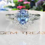 Load image into Gallery viewer, Elegance Redefined: Oval Blue Moissanite Ring Set &amp; Marquise Moissanite Highlights
