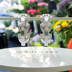 Load image into Gallery viewer, Sunkissed Gleam: Pear Citrine Hoop Earrings with Moissanite Crescent.
