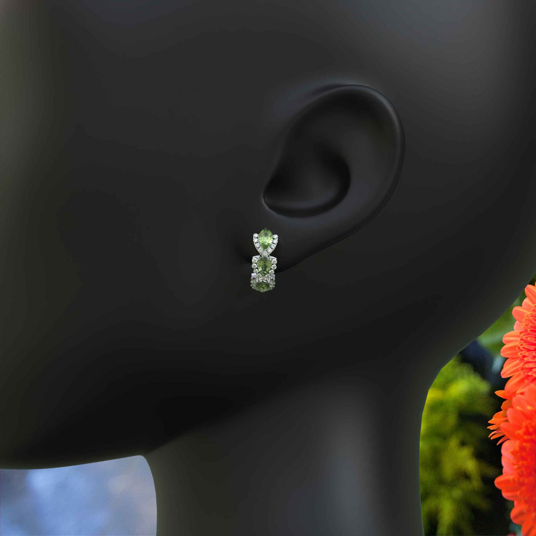 Nature’s Sparkle: Peridot Pear Hoop Earrings with Moissanite Halo.