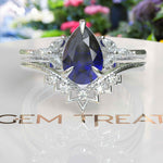 Load image into Gallery viewer, Timeless Love Story: Pear Blue Sapphire Wedding Set &amp; Marquise Moissanite Details
