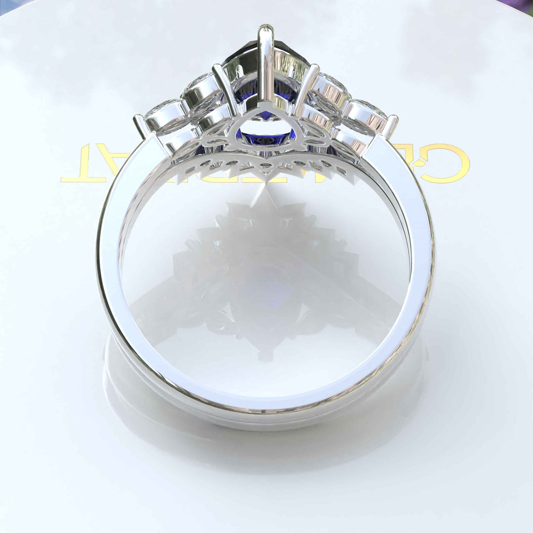 Timeless Love Story: Pear Blue Sapphire Wedding Set & Marquise Moissanite Details