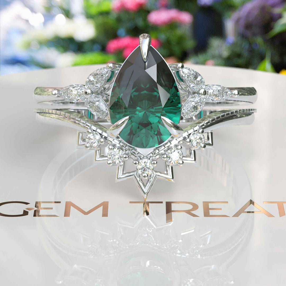 Nuptial Wonders in Verdant: Dive into the Pear Cut Green Emerald Ring Set, Adorned with Marquise Gems