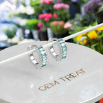 Load image into Gallery viewer, Mesmerizing Tides: Cyan Blue Moissanite Hoop Earrings with Baguette Cut.
