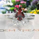 Load image into Gallery viewer, Fiery Passion Unveiled: Kite Cut Garnet Wedding Ring Set Adorned with Marquise Side Stones
