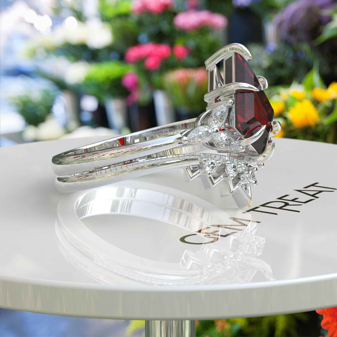 Fiery Passion Unveiled: Kite Cut Garnet Wedding Ring Set Adorned with Marquise Side Stones