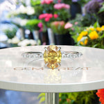 Load image into Gallery viewer, Sunny Elegance: Oval Yellow Sapphire Ring Adorned with Marquise Moissanite Accents
