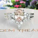 Load image into Gallery viewer, Blush Tones Meet Brilliance: Oval Morganite Ring Set, Enhanced by Marquise Moissanites
