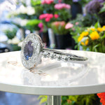 Load image into Gallery viewer, Stunning Round Color-Changing Alexandrite Ring with Moissanite Halo
