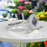 Load image into Gallery viewer, Stunning Round Color-Changing Alexandrite Ring with Moissanite Halo
