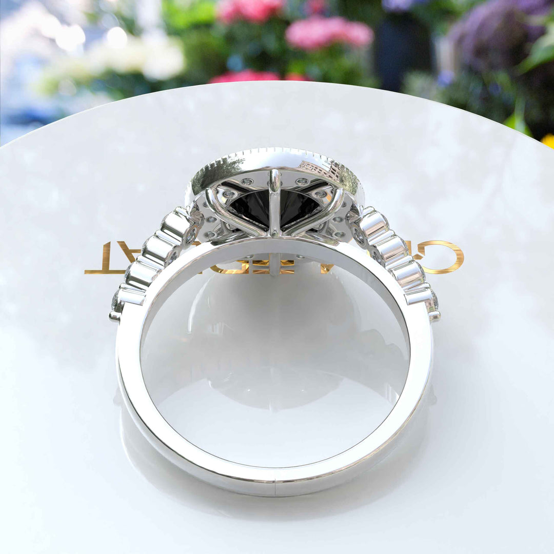 Elegant Radiance: Round Black Onyx Ring with Sparkling Halo Detail