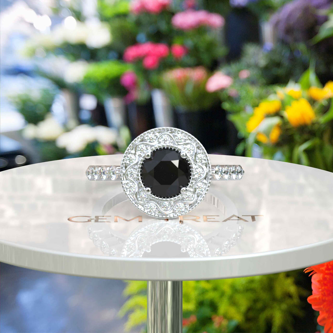 Elegant Radiance: Round Black Onyx Ring with Sparkling Halo Detail