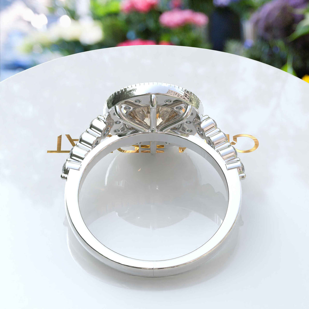 Golden Glimmer: Round Champagne Moissanite Crowned with Halo Brilliance.