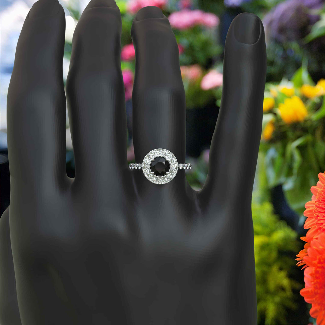 Elegant Radiance: Round Black Onyx Ring with Sparkling Halo Detail