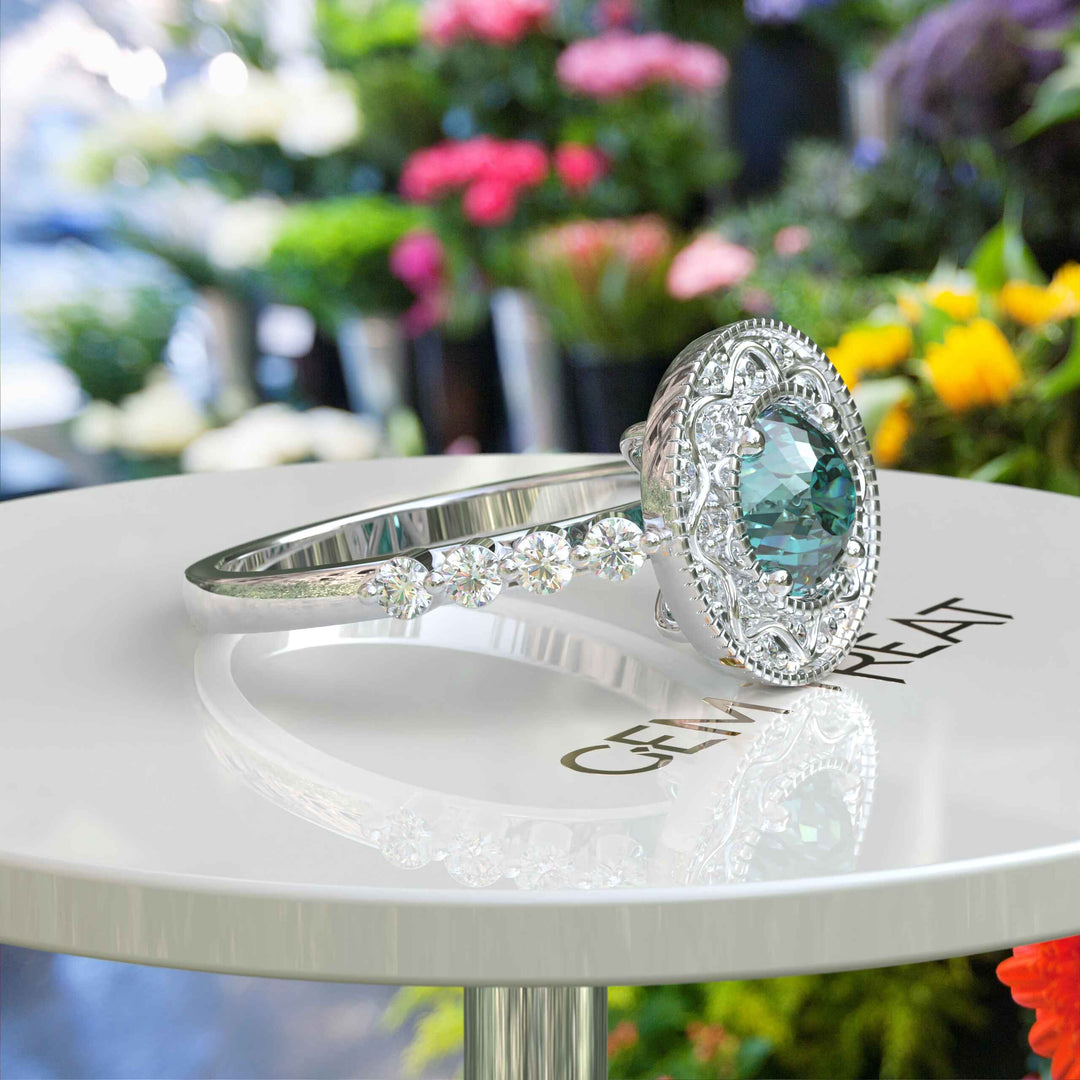 Aqua Elegance: Portuguese Cut Cyan Blue Moissanite Ring with Sparkling Halo Accent