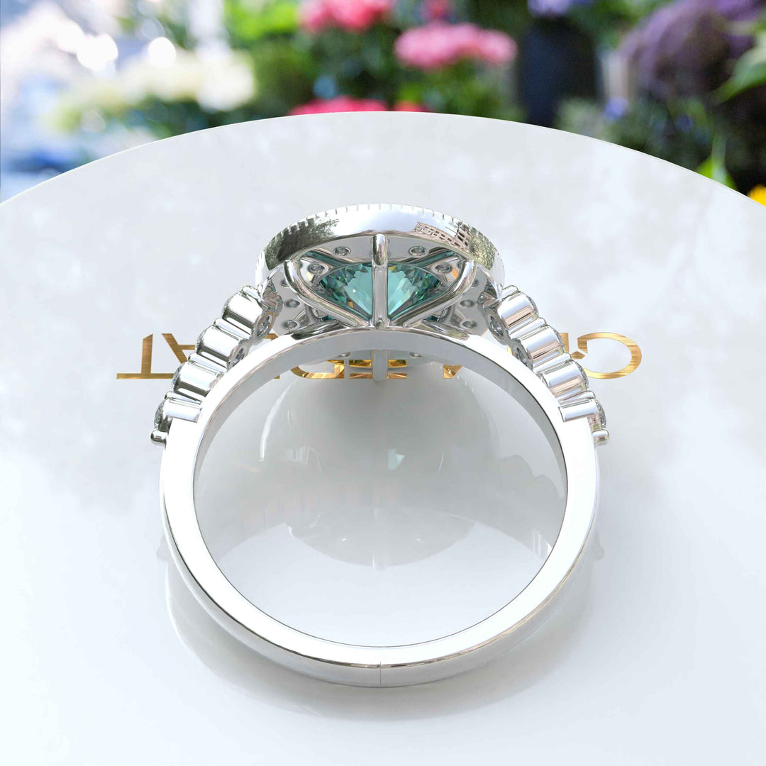 Aqua Elegance: Portuguese Cut Cyan Blue Moissanite Ring with Sparkling Halo Accent