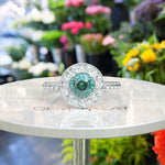 Load image into Gallery viewer, Aqua Elegance: Portuguese Cut Cyan Blue Moissanite Ring with Sparkling Halo Accent
