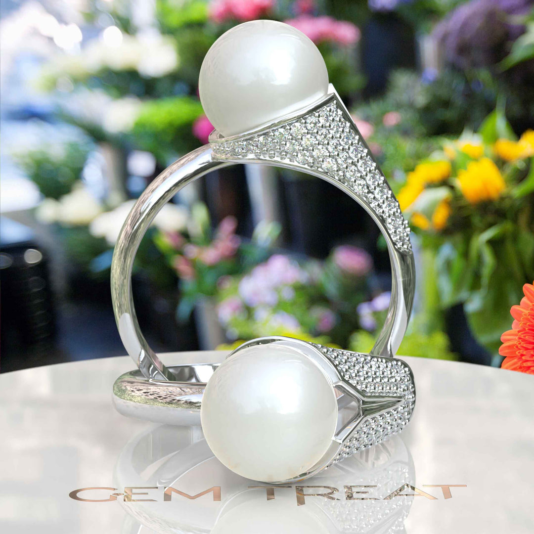 Pearlescent Majesty: Silver Ring Featuring Lustrous Pearl & Sparkling Moissanite Accents