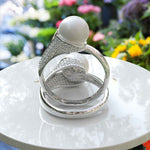 Load image into Gallery viewer, Pearlescent Majesty: Silver Ring Featuring Lustrous Pearl &amp; Sparkling Moissanite Accents
