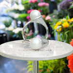 Load image into Gallery viewer, Pearlescent Majesty: Silver Ring Featuring Lustrous Pearl &amp; Sparkling Moissanite Accents
