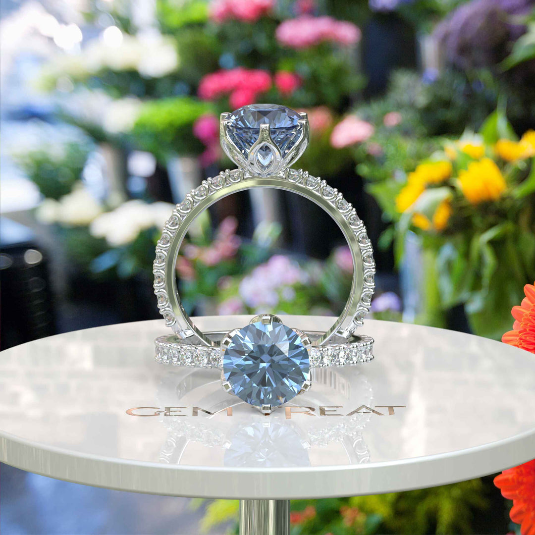 Iconic Beauty: Classic Round Blue Moissanite Ring for The Perfect Proposal