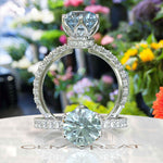 Load image into Gallery viewer, Elegant Round-Cut Aquamarine Under Halo Engagement Ring
