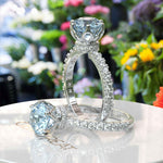 Load image into Gallery viewer, Elegant Round-Cut Aquamarine Under Halo Engagement Ring
