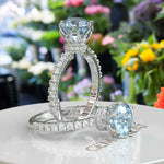 Load image into Gallery viewer, Elegant Round-Cut Aquamarine Under Halo Engagement Ring
