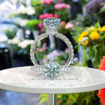 Load image into Gallery viewer, Elegant Round-Cut Aquamarine Under Halo Engagement Ring
