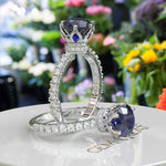 Load image into Gallery viewer, Deep Blue Elegance: Round Sapphire Under Halo Engagement Ring
