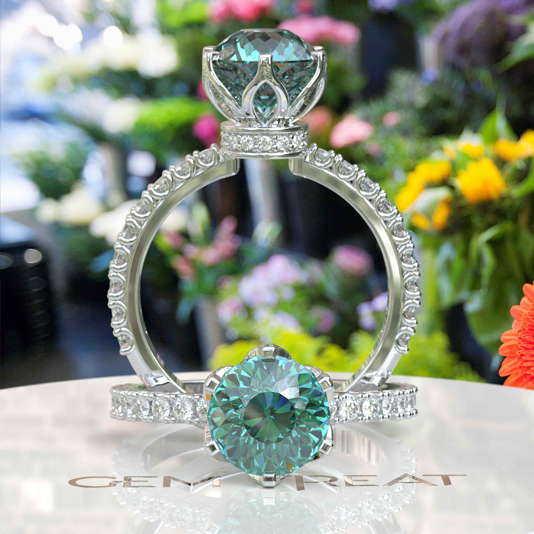 Ocean's Serenade Captured: Cyan Blue Portuguese Cut Adorns Under Halo Ring Setting