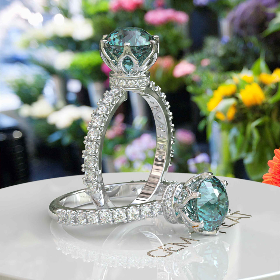 Ocean's Serenade Captured: Cyan Blue Portuguese Cut Adorns Under Halo Ring Setting