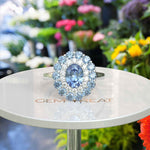 Load image into Gallery viewer, Stunning Oval Blue Moissanite Surrounded by Glistening Double Halo Ring
