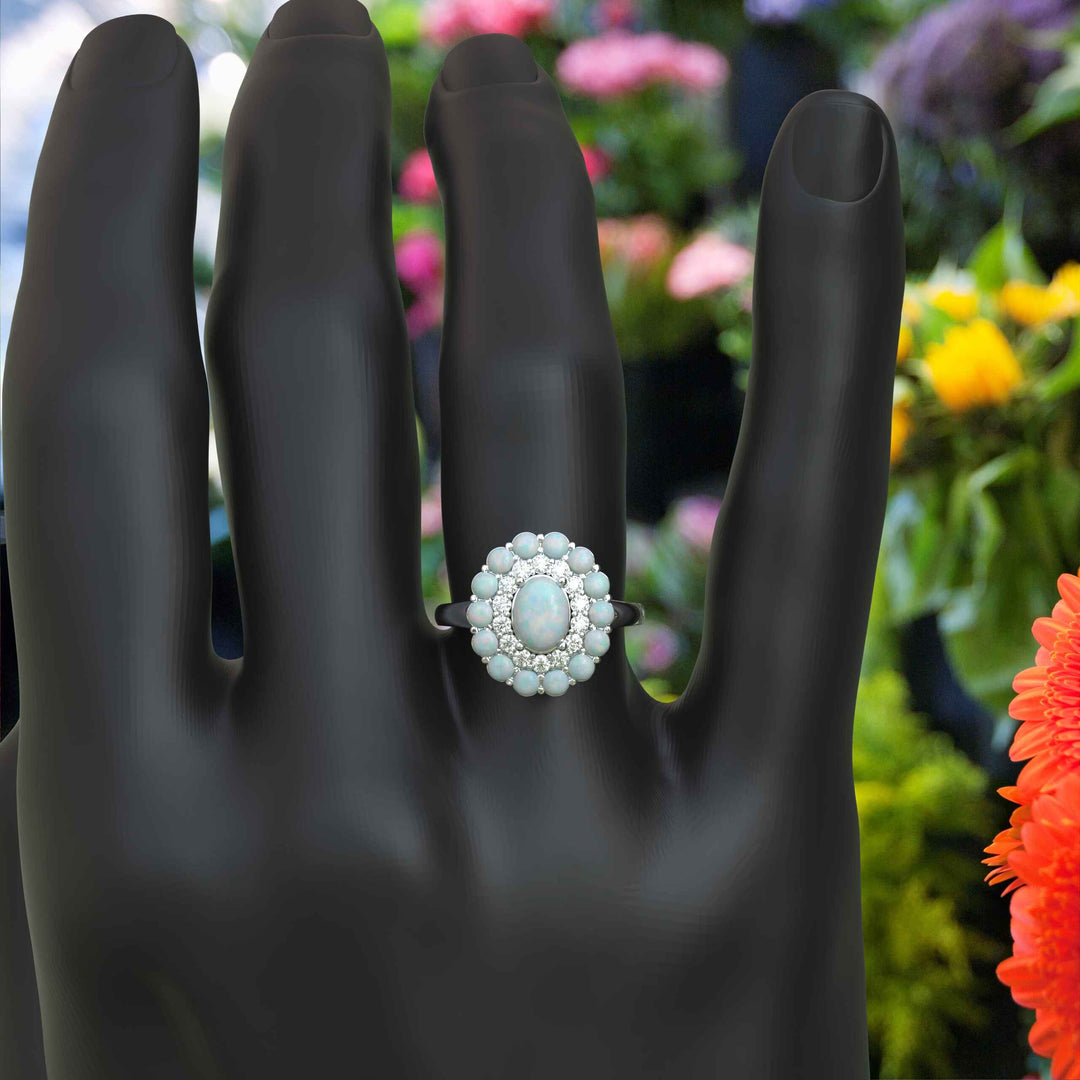 Ethereal Glow: Oval Opal Centerpiece Ring Surrounded by Moissanite and Opal Halo