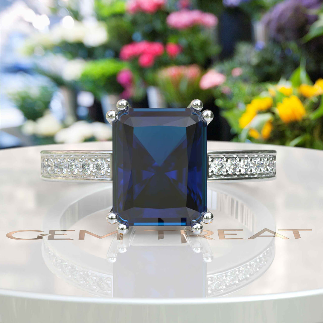 Deep Blue Majesty: 4.0ct Emerald Cut London Blue Topaz Ring.