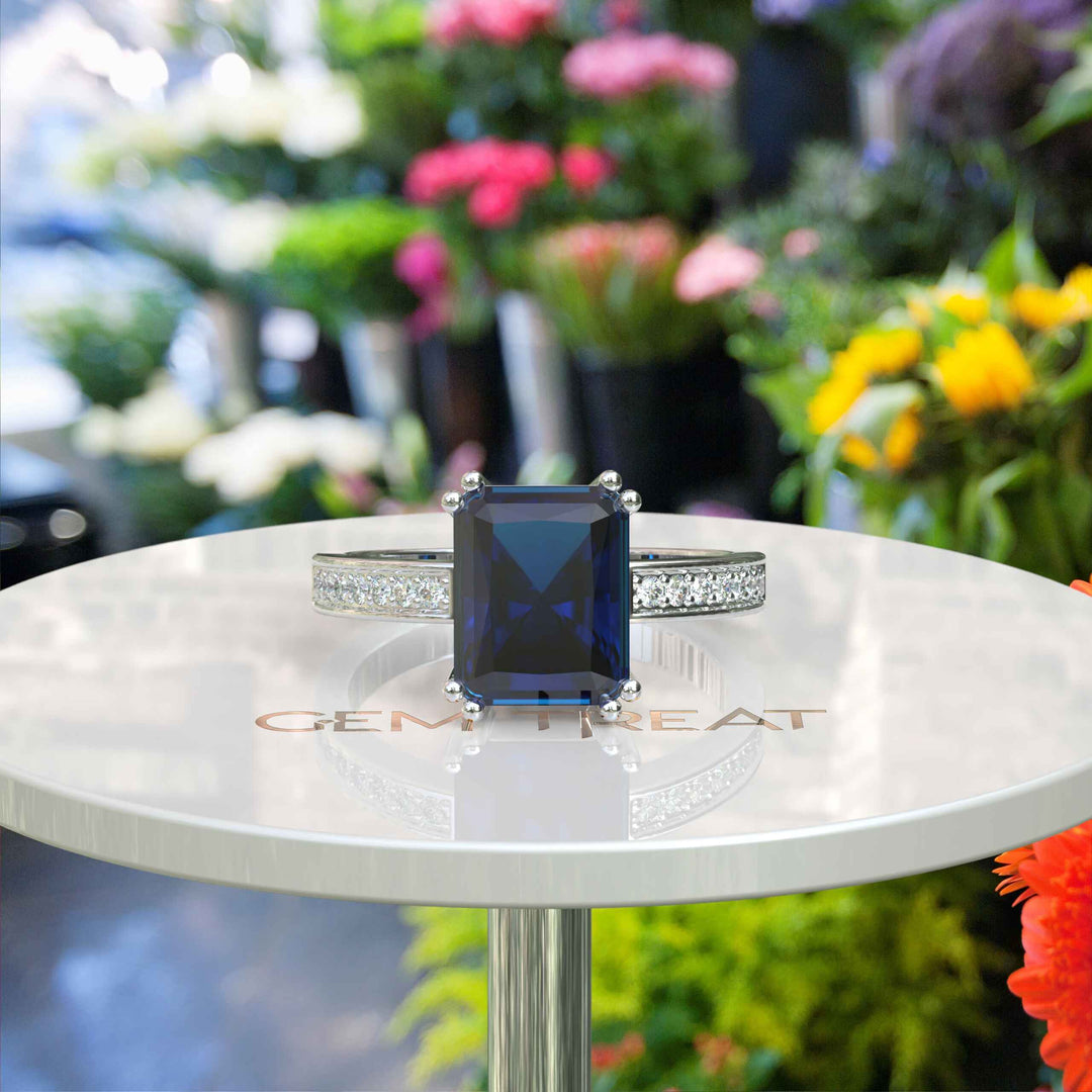 Deep Blue Majesty: 4.0ct Emerald Cut London Blue Topaz Ring.