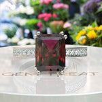 Load image into Gallery viewer, Classic Elegance: 4.0ct Emerald-Cut Ruby Engagement Ring for the Timeless Bride.
