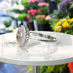 Load image into Gallery viewer, Capture Her Heart: Oval Champagne Moissanite with Lustrous Moissanite Halo
