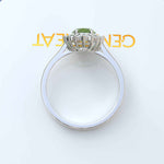 Load image into Gallery viewer, Vibrant Elegance Unleashed: Celebrate with an Oval Peridot Center in This Halo Ring
